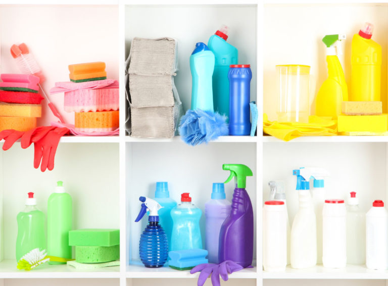 Child care center supply closet is stocked and organized with bottles, paper towels and cleaning supplies