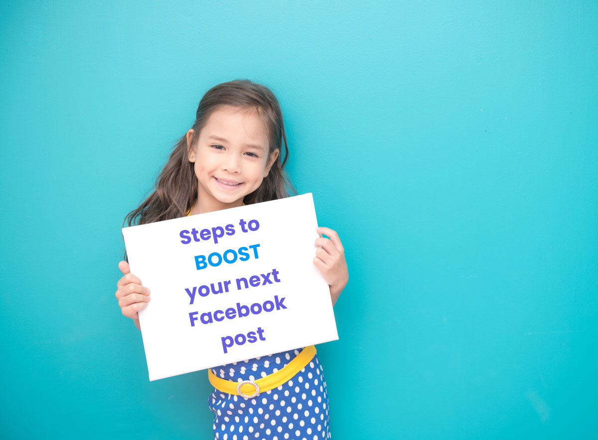 Girl holding a sign showing steps to boost a Facebook post for your business