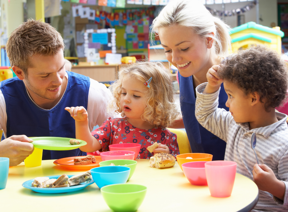 Parents engaging in snack time at child care center