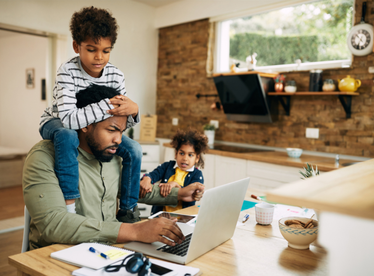 parent-working-child-on-head-pulling-arm