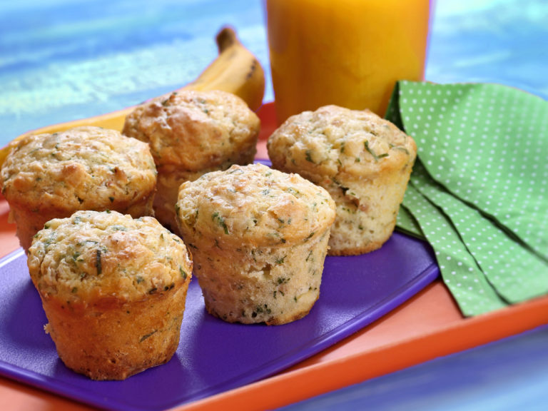 Snack tray of muffins and banana for children at a child care center