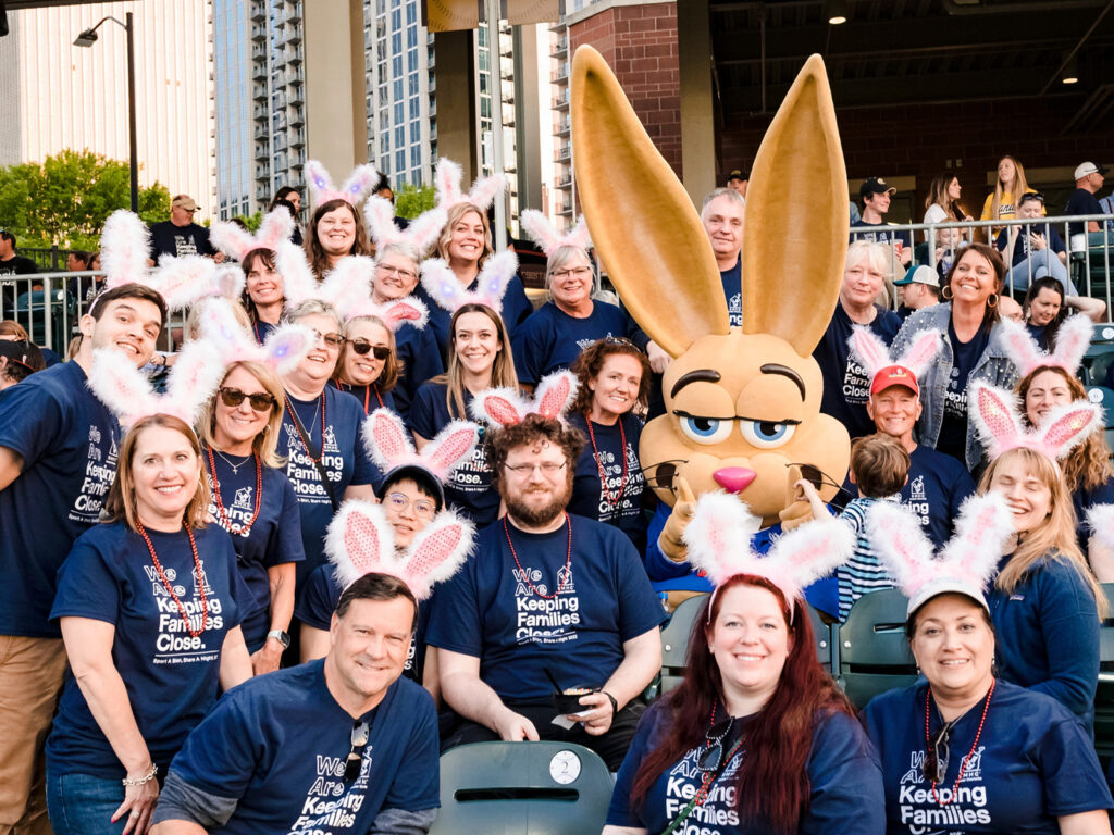Jackrabbit employees in stands with bunny ears