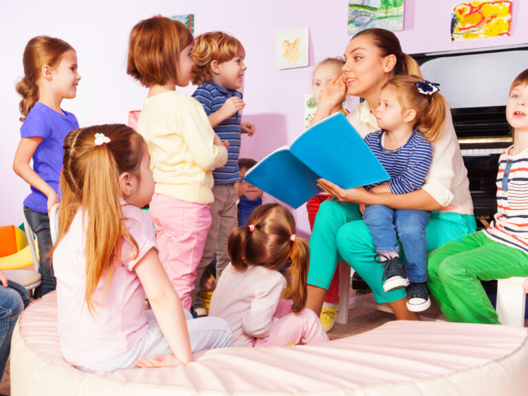 Teacher reads to students during a story-time.